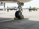 Dim Gray Premium Heavy Duty Rubber Aircraft Wheel Chock 225 x 195 x 333 mm with Yellow Carrying Rope for Safe Use