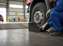 Dark Slate Gray Premium Heavy Duty Vehicle Wheel Chock with Solid Rubber Construction, Moulded Handle, and 20 Tonnes Max Load Capacity - 260 x 160 x 190 mm