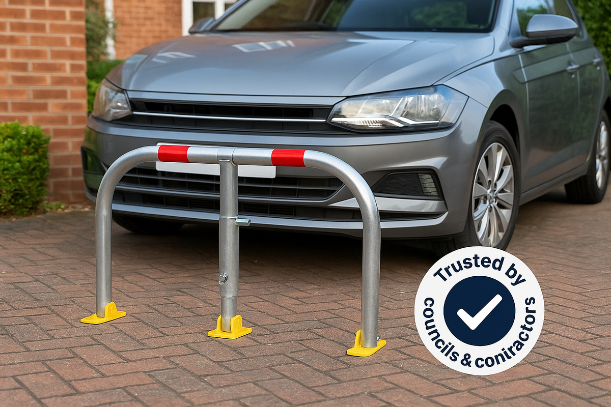 Driveway fold-down parking barrier in use securing private space.  