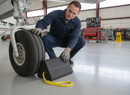 Gray Premium Heavy Duty Rubber Aircraft Wheel Chock 225 x 195 x 333 mm with Yellow Carrying Rope for Safe Use